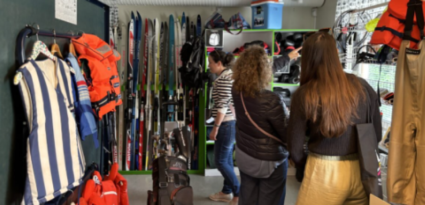 People browsing the sport equipment that can be borrowed in the leisure library