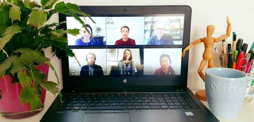Online meeting with project partners Online meeting on a laptop