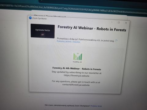 A screenshot of a Zoom meeting interface titled "Forestry AI Webinar - Robots in Forests" with a participant named Agnieszka Nedza. The screen shows a message indicating that the host has been informed of the participant's presence. Below is a logo for Forestry AI and information about the Forestry AI 4th Webinar, including a link to subscribe to their newsletter and contact information.