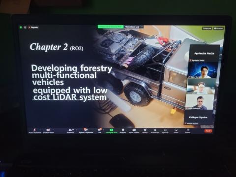 A screenshot of a Zoom meeting showing a presentation slide titled "Chapter 2 (RO2) Developing forestry multi-functional vehicles equipped with low cost LiDAR system." The slide includes an image of a vehicle equipped with technology. The participant panel on the right shows attendees including Agnieszka Nedza, Walter Yen, Heesung Woo, Matías Mattamala, and Philippe Giguère.