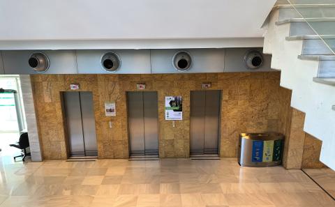 An entrance hall, photo towards elevators in Regional Ministry of Junta de Andalucia, Spain.