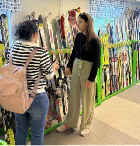 People browsing the sport equipment that can be borrowed in the leisure library