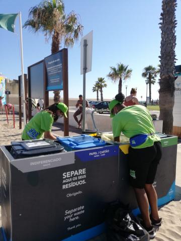 Maintenance of recycling bins by young people on the beach