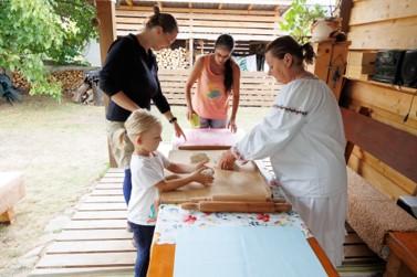 Tourists leartning how to prepare local food