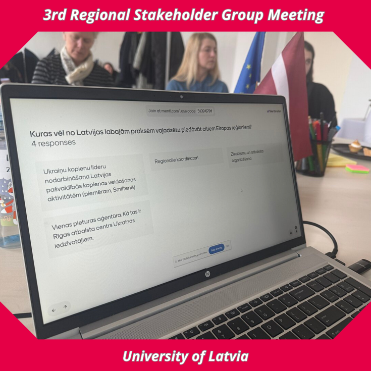 3rd Regional Stakeholder Group Meeting  Laptop with presentation, people sitting at a table in the background