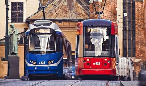 Two trams on a street in Krakow