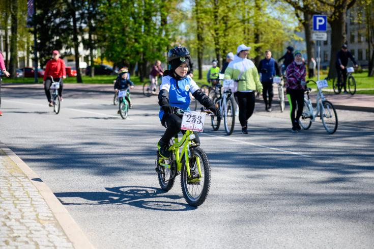 a child going on a bike in latvia
