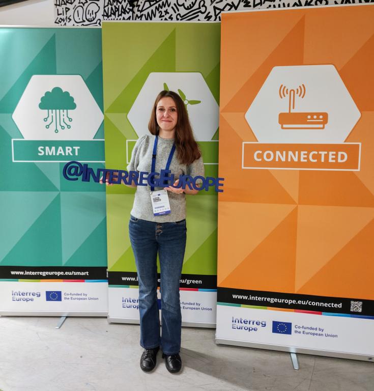 We seen young lady with logo Interreg Europe