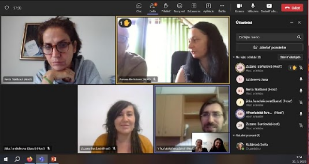 a screenshot of a meeting in zoom with men and women discussing
