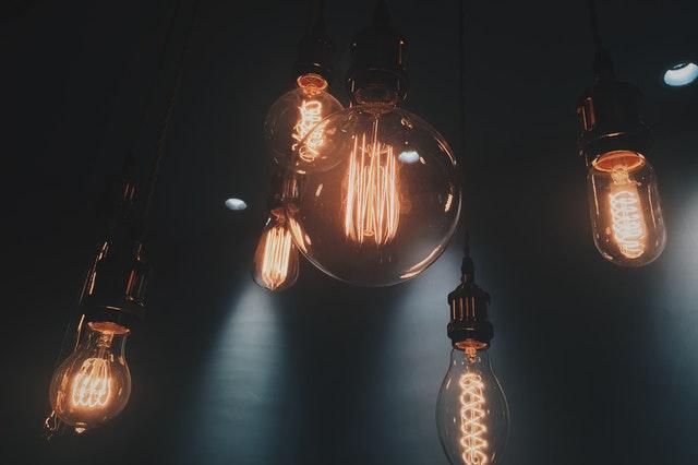 Light bulbs against dark background