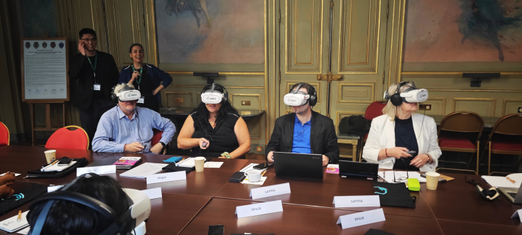 People experimenting virtual reality in conference room 