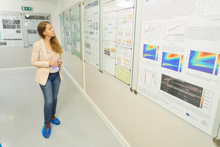 Woman looking at wall of information