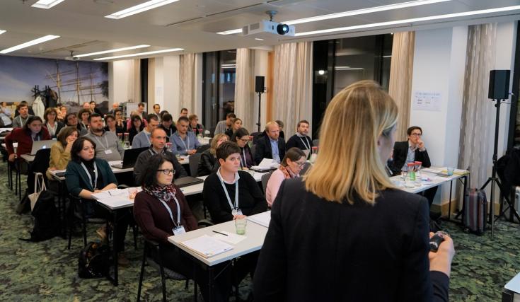 Class of adults listening to a presentation