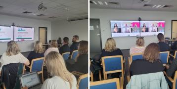 Group of people in a room, during zoom meeting