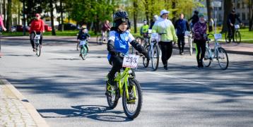 a child going on a bike in latvia