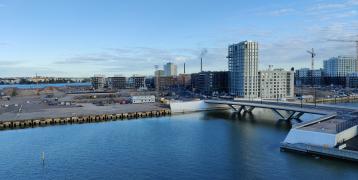 Buildings in industrial area next to river bank Buildings in industrial area next to river bank