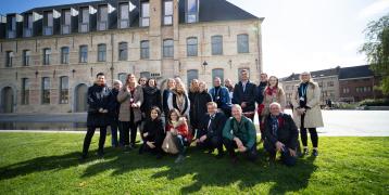 Picture of the group of people in front of the city library