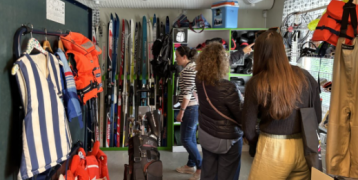 People browsing the sport equipment that can be borrowed in the leisure library