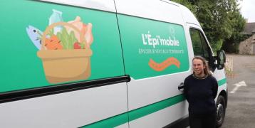 You can see the project manager in front of the truck used for the food distribution.