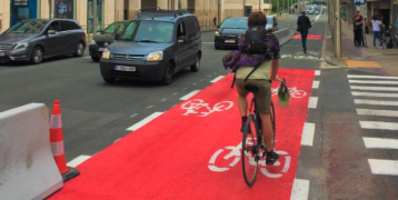 Person on bike in city