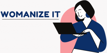 Blue lettering 'Womanize IT'. The girl standing and holding a laptop in her hands and stares at its screen.