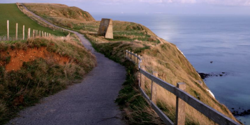 Walking path next to the sea Walking path next to the sea