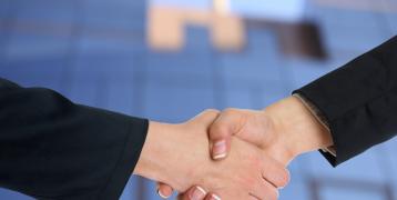Handshake and buildings Handshake