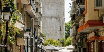 Thessaloniki street with a tower in the background