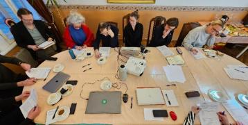 a group of stakeholders around a table